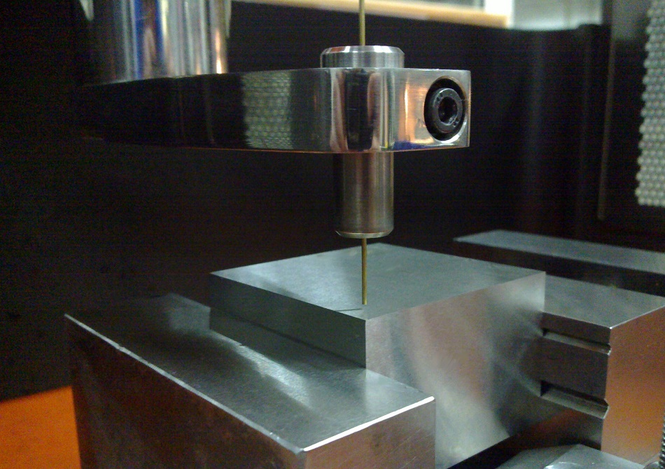 Small hole-drilling EDM machine