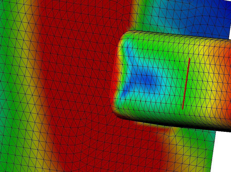 Screenshot of a 3D CAD model displayed with a colorful mesh to show stress distribution