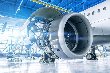 maintenance work on an airplane turbine